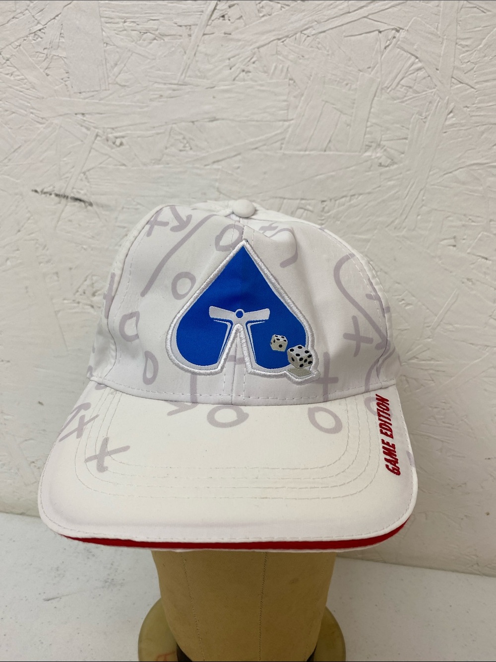 White Baseball Cap with Blue Spade Logo and Dice Accent carnival players club